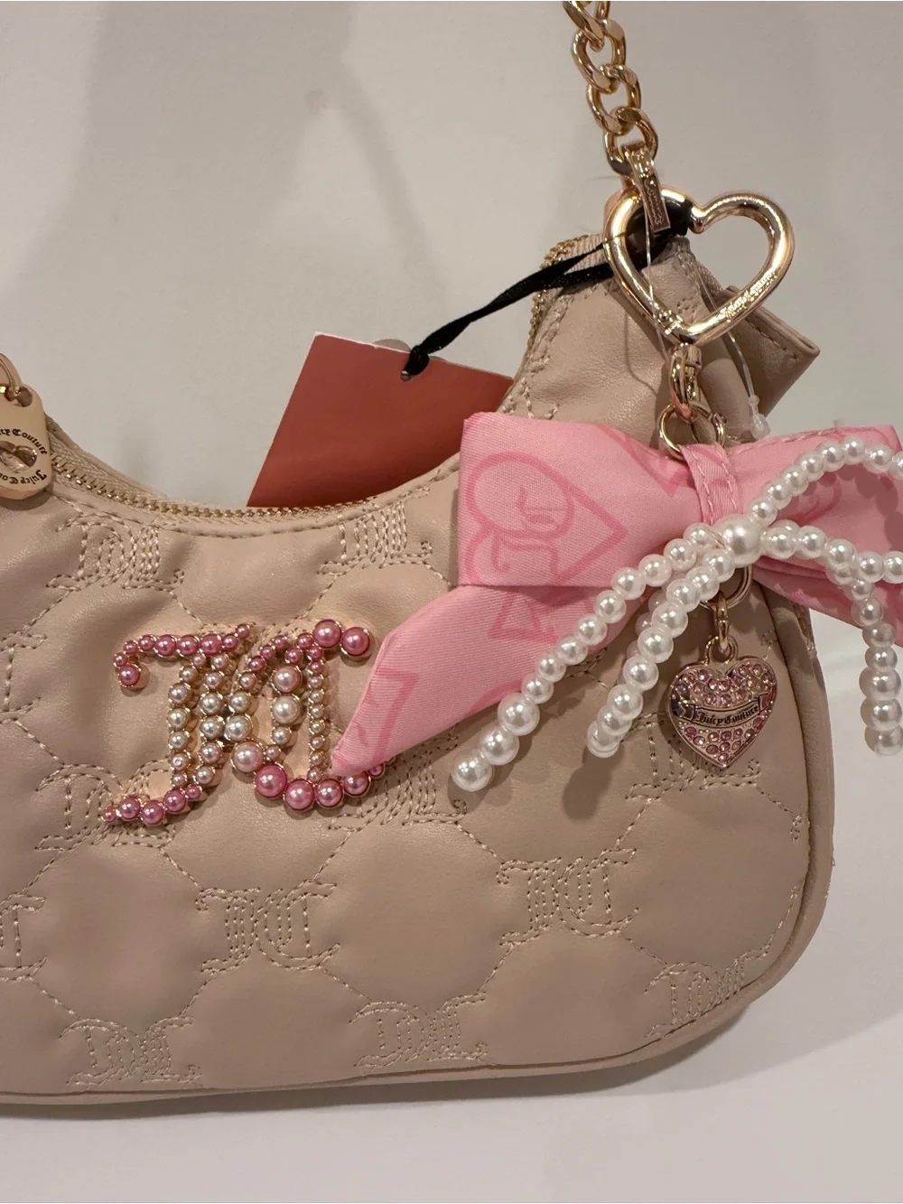 Juicy Couture Beige Quilted Shoulder Bag with Pink Bow and Pearl Charm